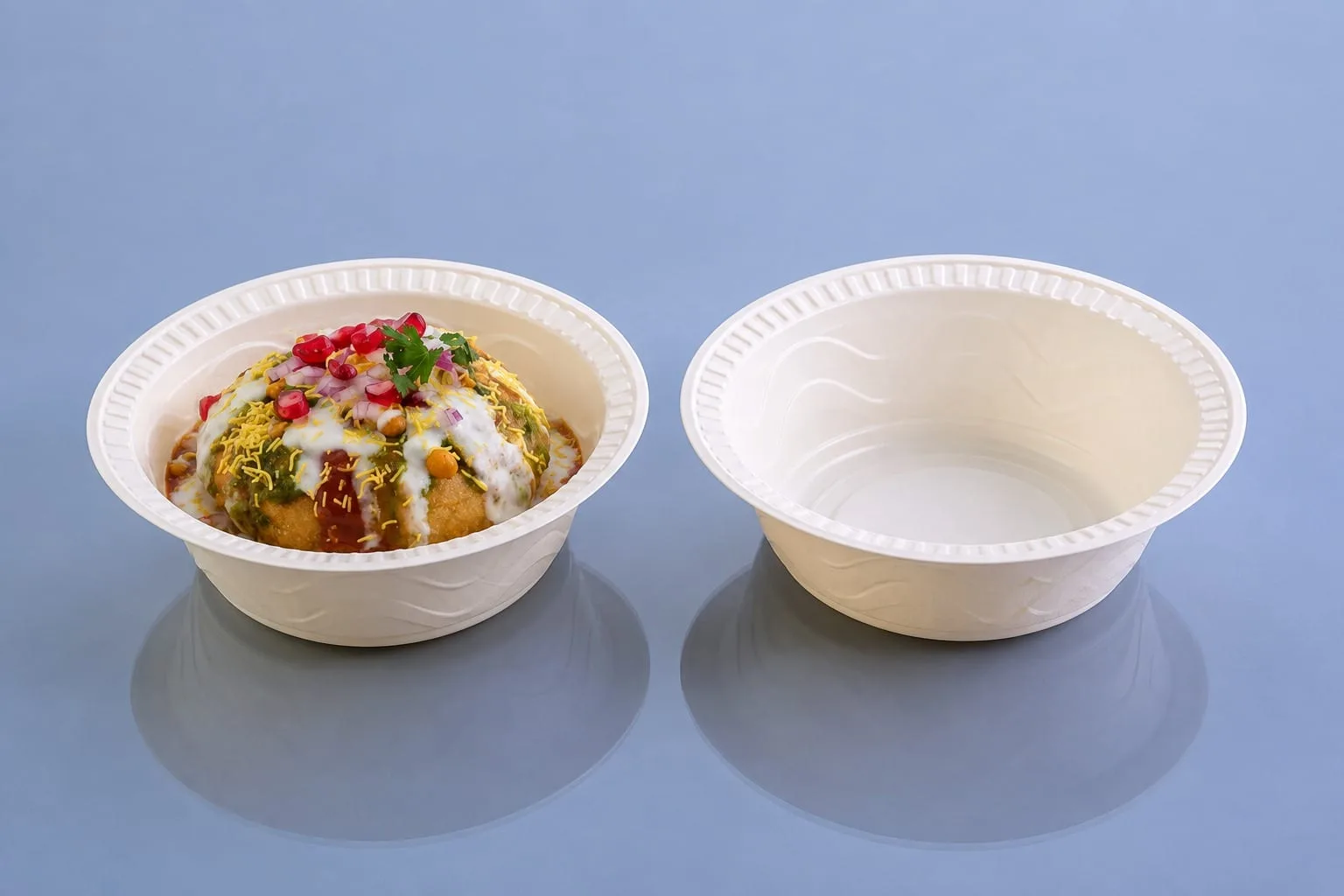 Eco Tray Round Cornstarch Bowl, code 7004, one holding dahi puri chaat, one empty