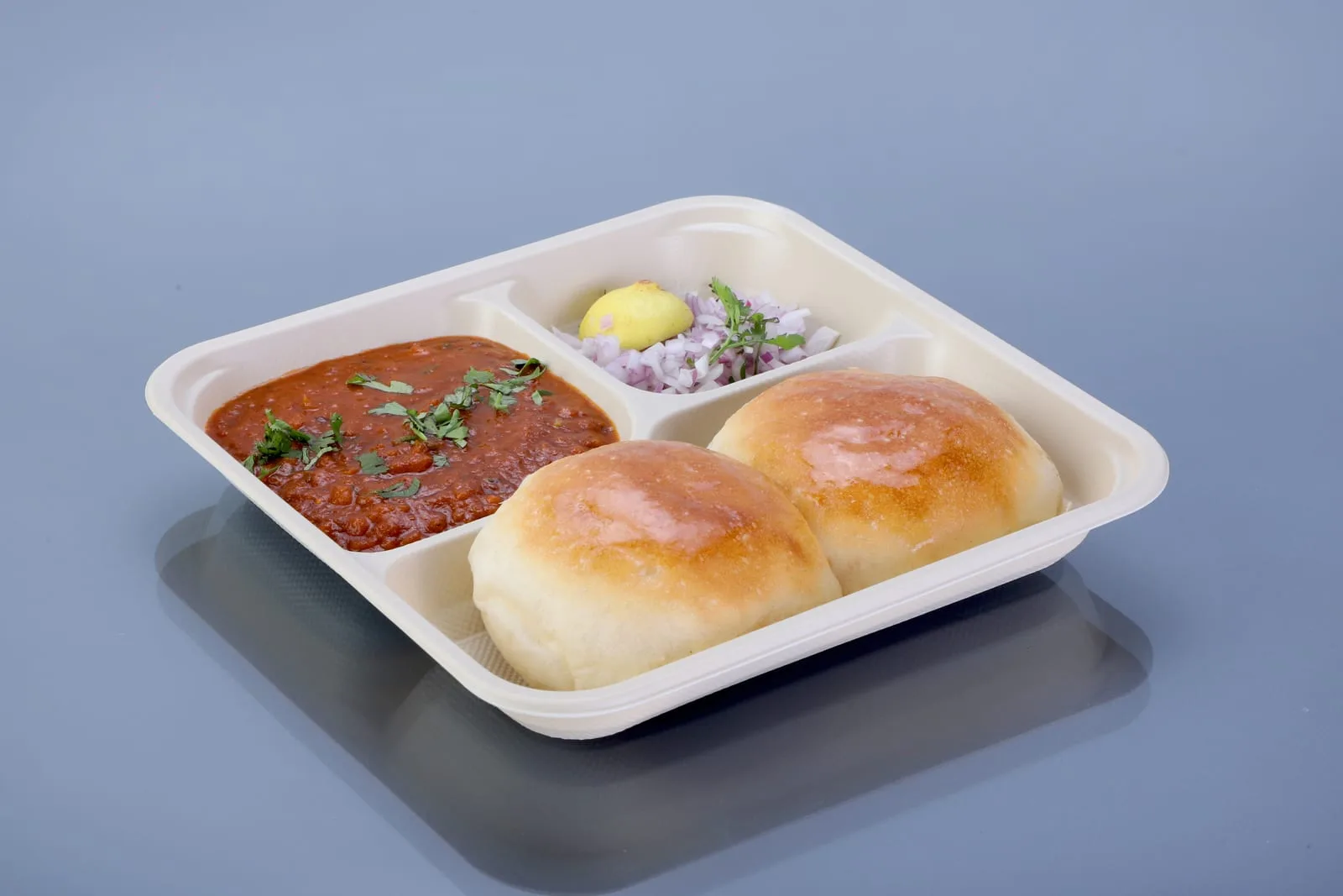 Eco Tray 3 Compartment Tray, code 7032, holding pav bhaji