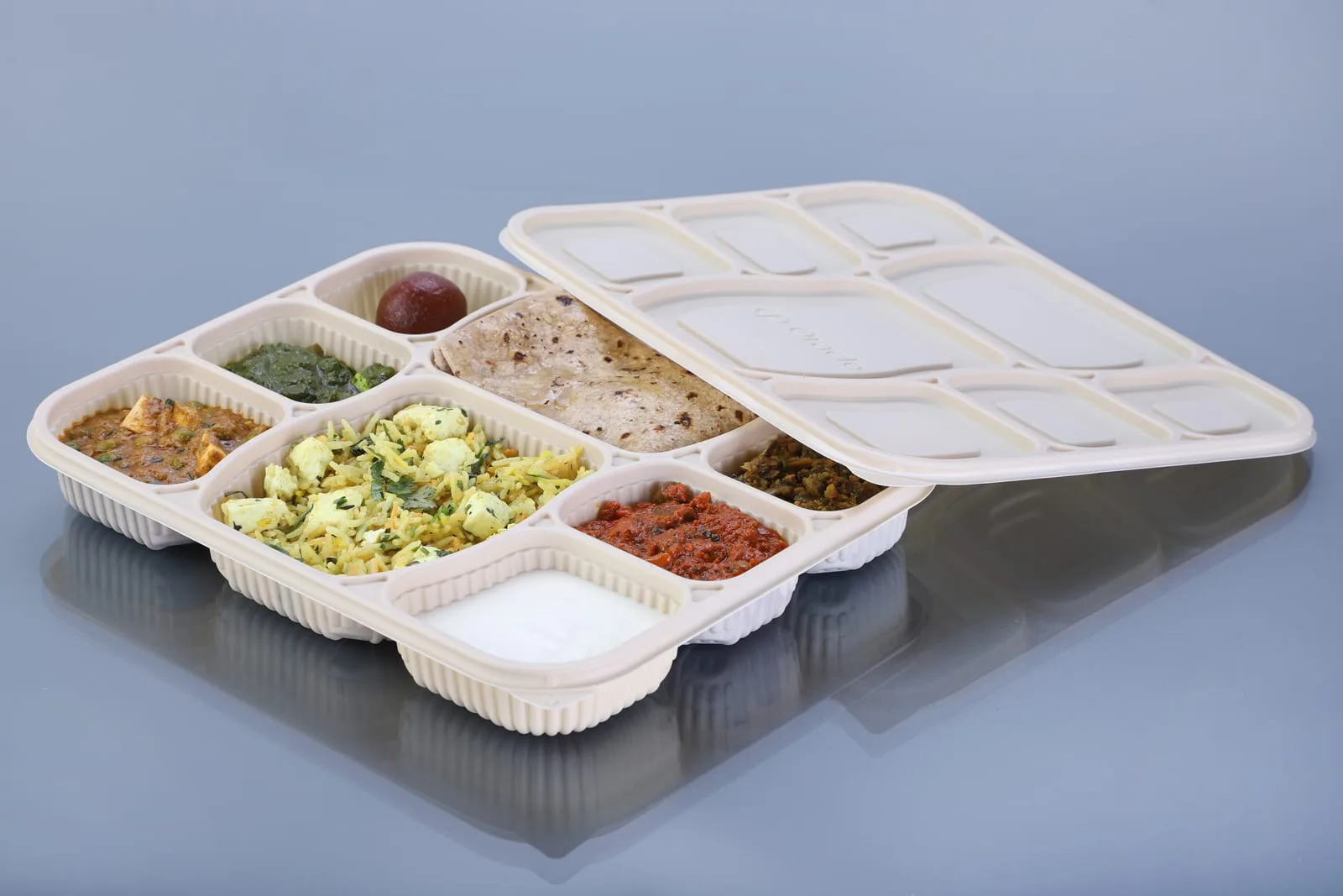 Eco Tray 8 Compartment Cornstarch Meal Box with Lid, codes 7048 and 7048L, holding a thali with roti and curries