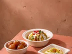 Oracle Group Eco Tray cornstarch bowls holding chaat and gulab jamun