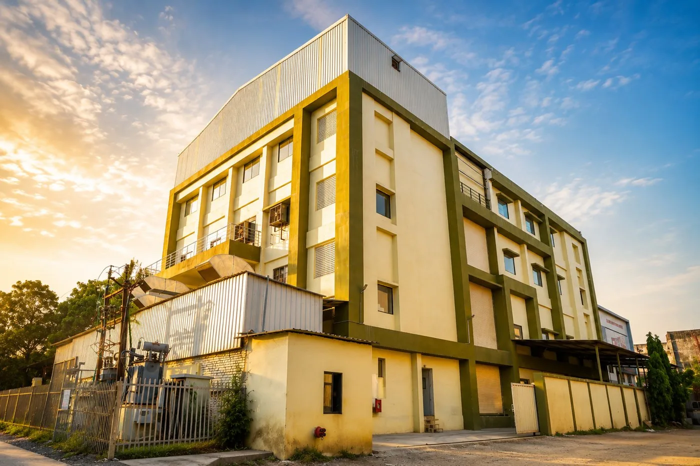 Oracle Group plant building in Silvassa at sunset