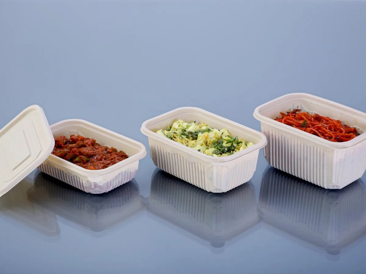 Oracle Group cornstarch rectangular containers 7084 and 7087 with takeaway food
